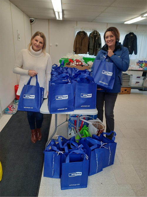 volunteers with donations for Chalmers Bag Donation